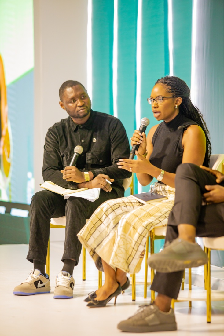 Two panellists mid-discussion at REMA 2025